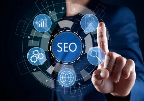business-man-pushing-button-with-word-seo_218381-5090 (1) SEO and Online Optimization