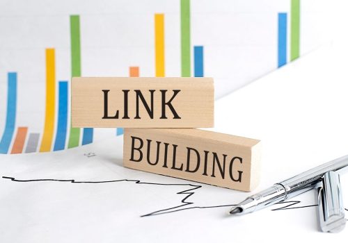 Link,Building,Text,On,Wooden,Block,On,Chart,Background,,Business